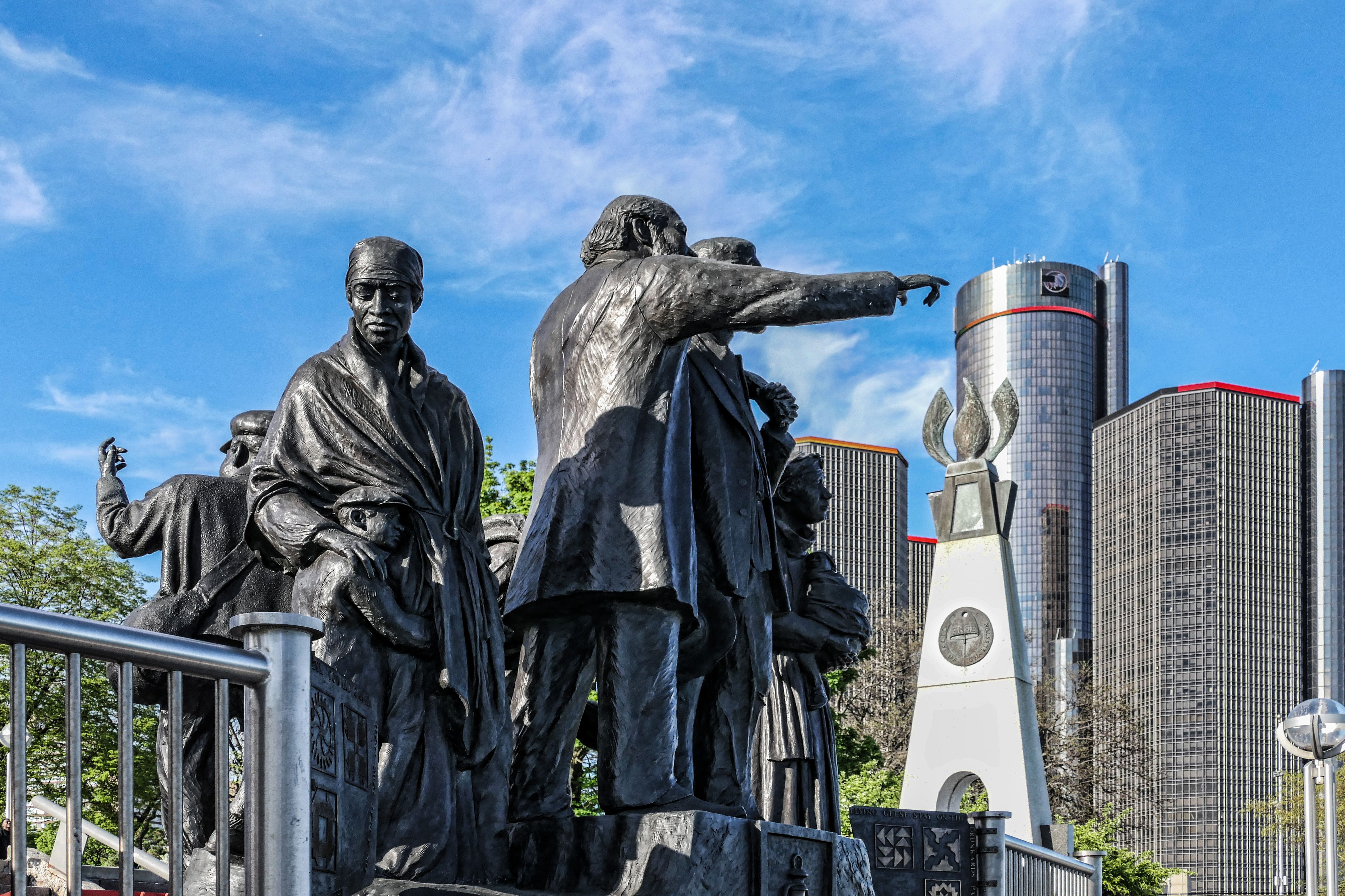 Gateway to Freedom Monument with Detroit skyline